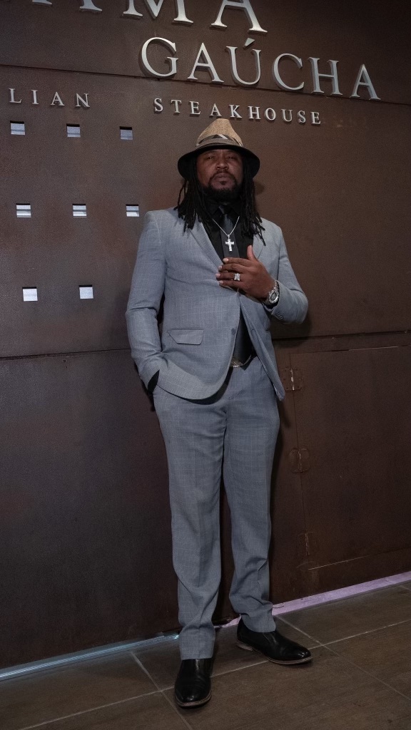 THA PARTY KING full-length press portrait
